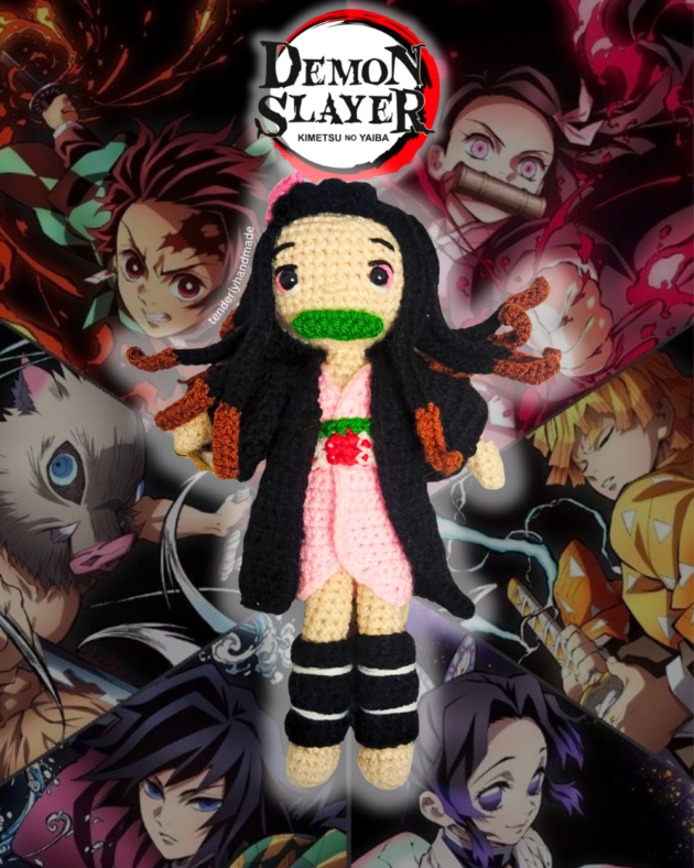 Frontal view of Nezuko Kamado amigurumi doll centered on a cinematic Demon Slayer character collage background.