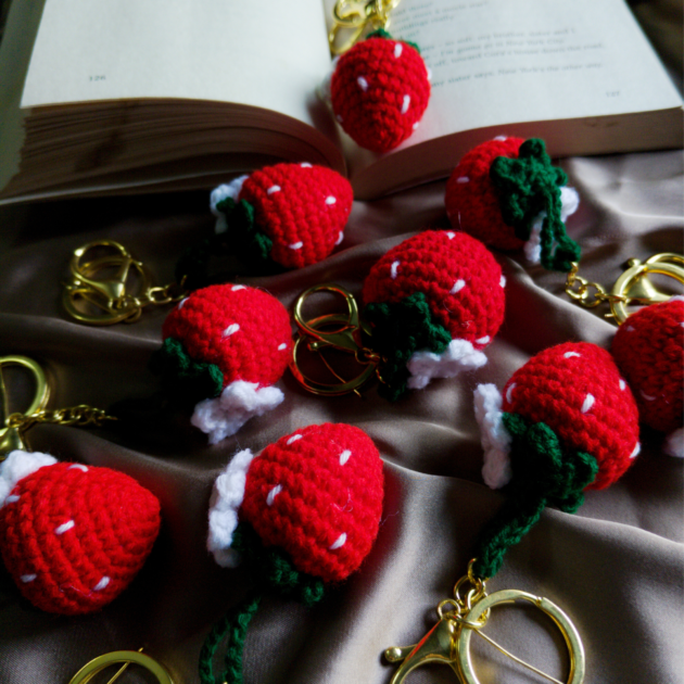 Handmade crochet strawberry keychains on satin fabric with book, cute aesthetic handmade gift and return favors India