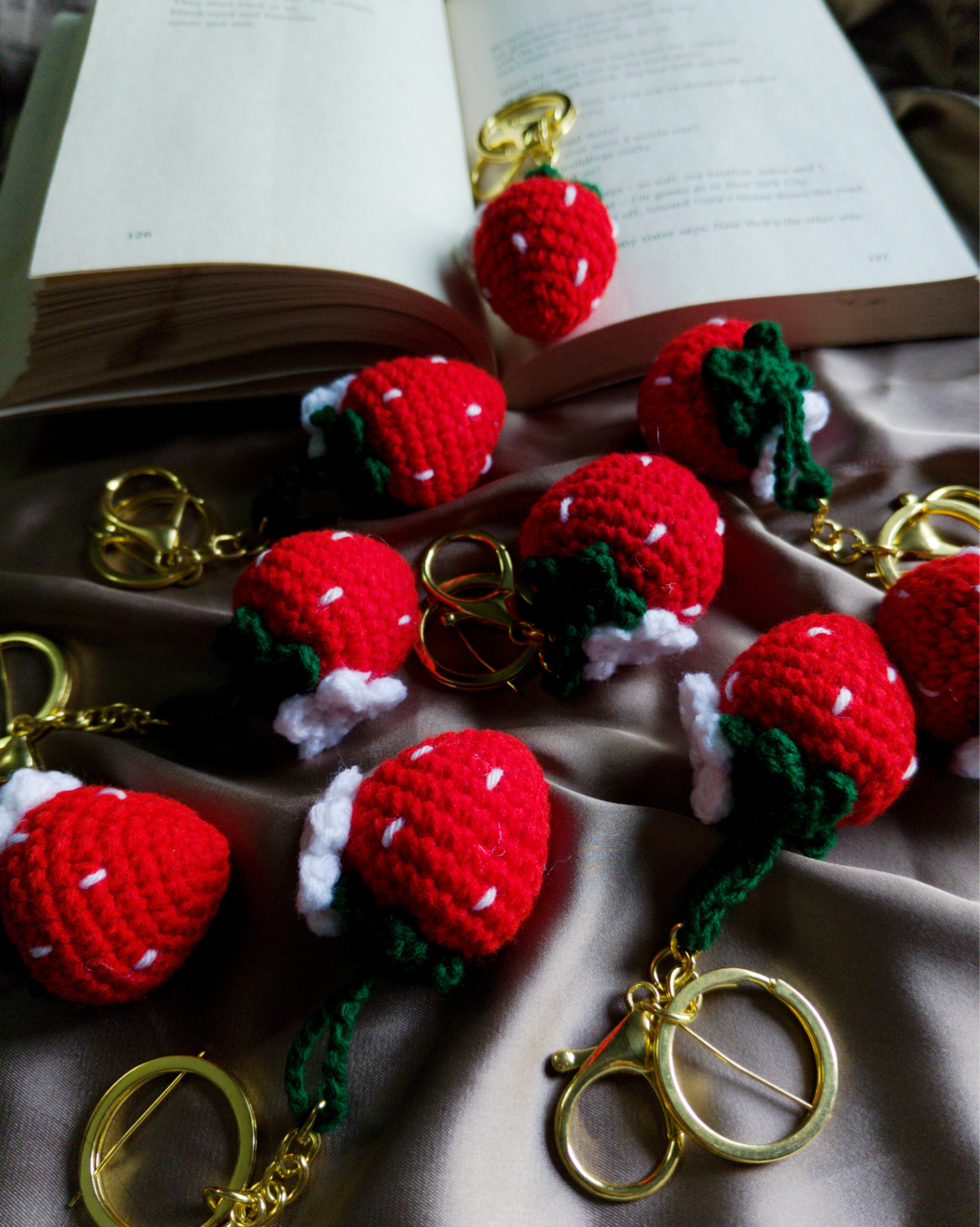 Handmade crochet strawberry keychains on satin fabric with book, cute aesthetic handmade gift and return favors India